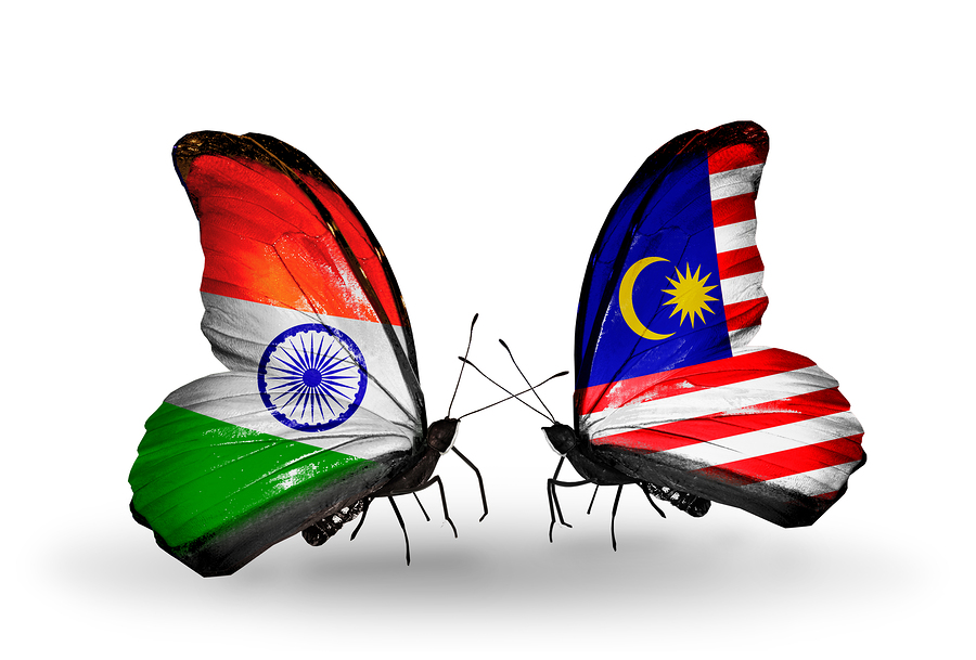 Two butterflies with flags on wings as symbol of relations India and Malaysia