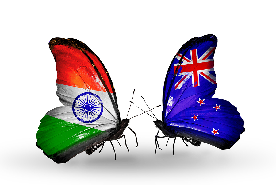 Two butterflies with flags on wings as symbol of relations India and New Zealand
