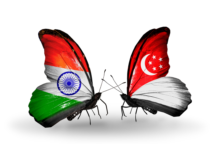 Two butterflies with flags on wings as symbol of relations India and Singapore