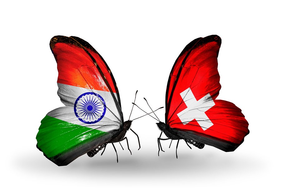 Two butterflies with flags on wings as symbol of relations India and Switzerland